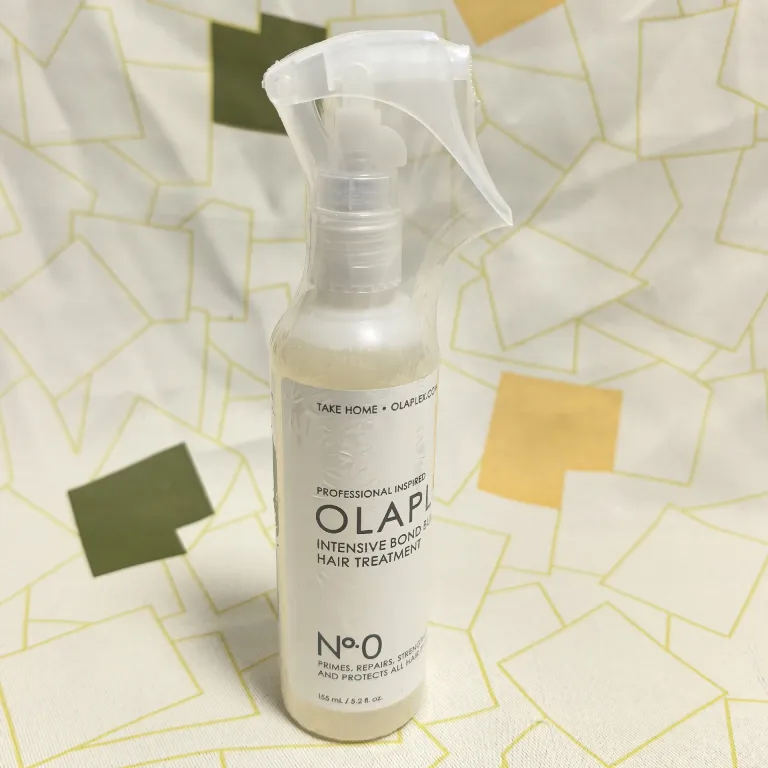 روغن مو OLAPLEX شماره 7 و اسپری ترمیم‌کننده شماره 0، ماسک مو بدون نیاز به آبکشی برای ترمیم موهای رنگ‌شده و آسیب‌دیده