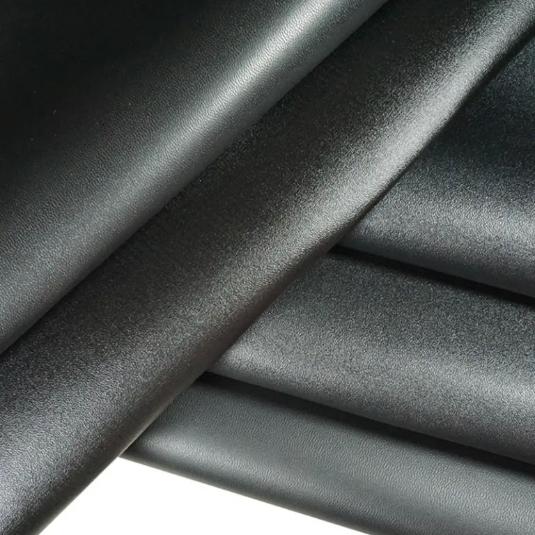 عمده چرم PVC 0.4-2.0mm طرح دانه‌بندی درشت مشکی زیره بافتنی پارچه مصنوعی زیره پارچه کیف و تودوزی