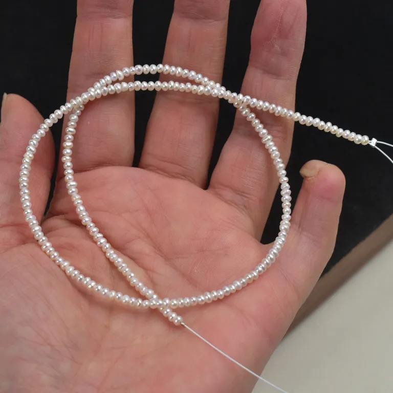 مینی مروارید آب شیرین طبیعی 2-3mm مرواریدهای تقریباً گرد و تخت کوچک، دانهای، نیمهساخته برای کاردستی، یک رشته به طول حدود 38cm