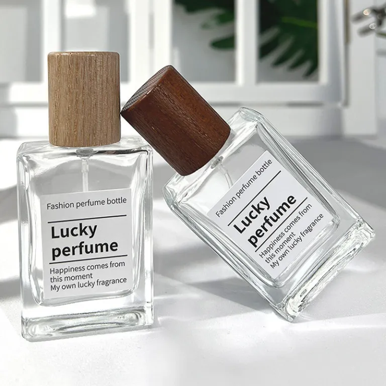 بطری تقسیم عطر با درپوش چوبی، بطری عطر قابل حمل لوکس با ظرفیت بالا، بطری خالی پمپی شیشه‌ای شفاف جایگزین