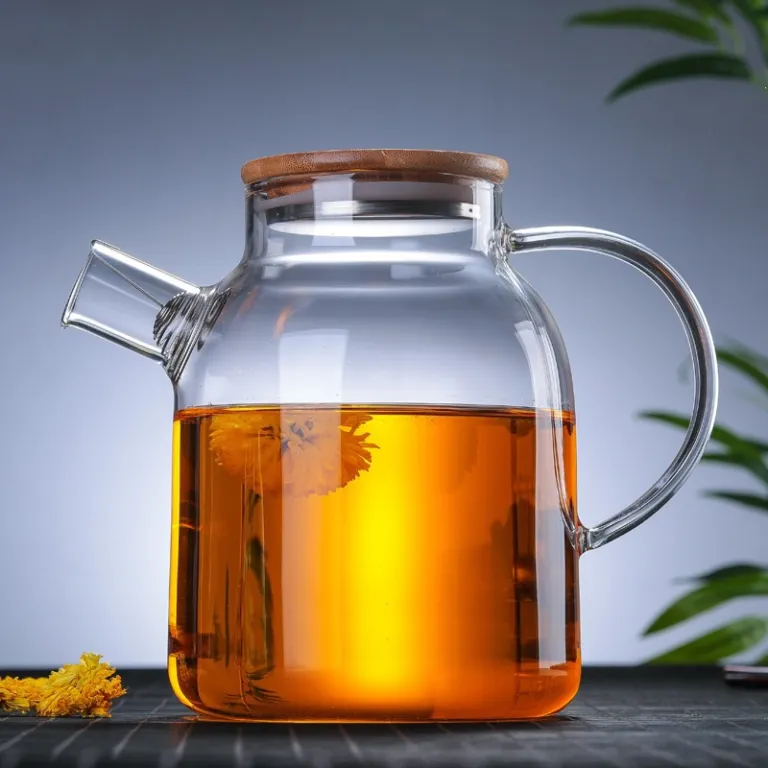 قوری شیشهای خانگی مقاوم به حرارت بالا برای جوشاندن آب، مناسب دم کردن چای با صافی، قوری چای گلدار، قابل استفاده روی شعله مستقیم، از جنس بوروسیلیکات