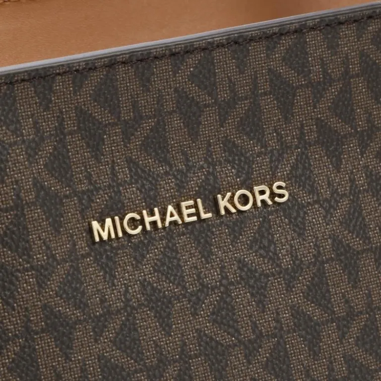 کیف دوشی زنانه MICHAEL KORS مدل Voyager طرح مونوگرام دورنگ