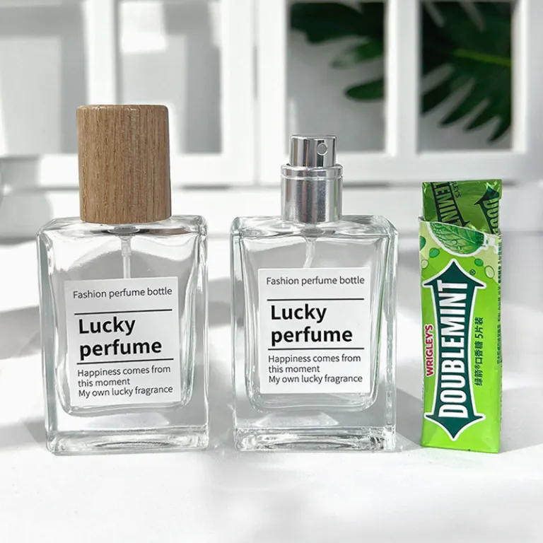 بطری تقسیم عطر با درپوش چوبی، بطری عطر قابل حمل لوکس با ظرفیت بالا، بطری خالی پمپی شیشه‌ای شفاف جایگزین