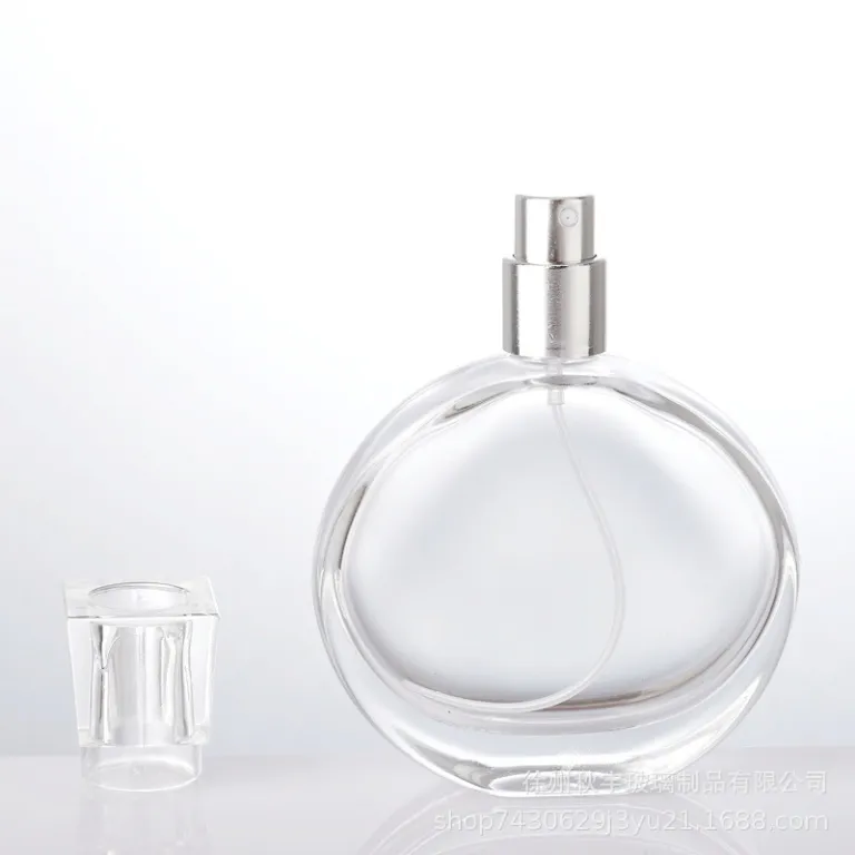 بطری شیشهای عطر جدید و لوکس موجود در انبار کارخانه، درب پیچی، قابل حمل، اسپری فشاری، بطری خالی نمونه