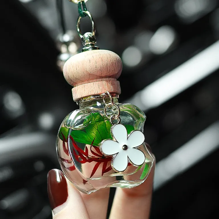 عطر آویز خودرو عمده کارخانه‌ای با رایحه ماندگار اسانس ملایم مناسب مردانه و زنانه