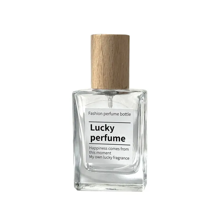 بطری تقسیم عطر با درپوش چوبی، بطری عطر قابل حمل لوکس با ظرفیت بالا، بطری خالی پمپی شیشه‌ای شفاف جایگزین