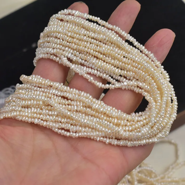 مینی مروارید آب شیرین طبیعی 2-3mm مرواریدهای تقریباً گرد و تخت کوچک، دانهای، نیمهساخته برای کاردستی، یک رشته به طول حدود 38cm