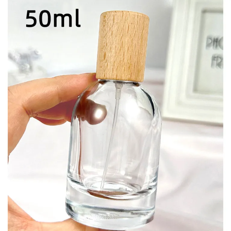 بطری تقسیم عطر با درپوش چوبی، بطری عطر قابل حمل لوکس با ظرفیت بالا، بطری خالی پمپی شیشه‌ای شفاف جایگزین