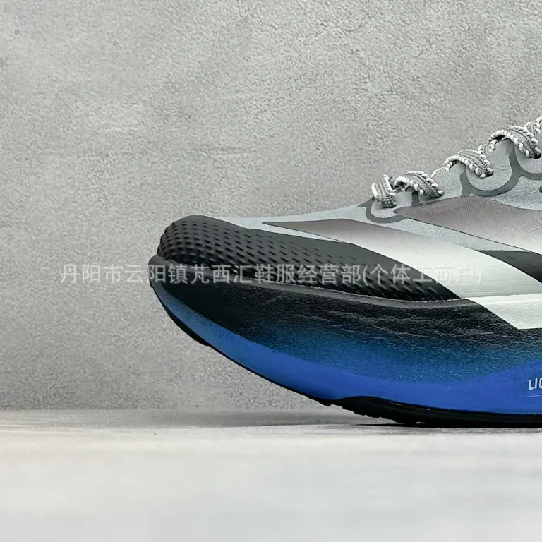 کفش دویدن مسابقهای آدیداس Adizero Evo SL اورجینال پوتیان با رویه مشی تنفسپذیر و مقاوم در برابر سایش