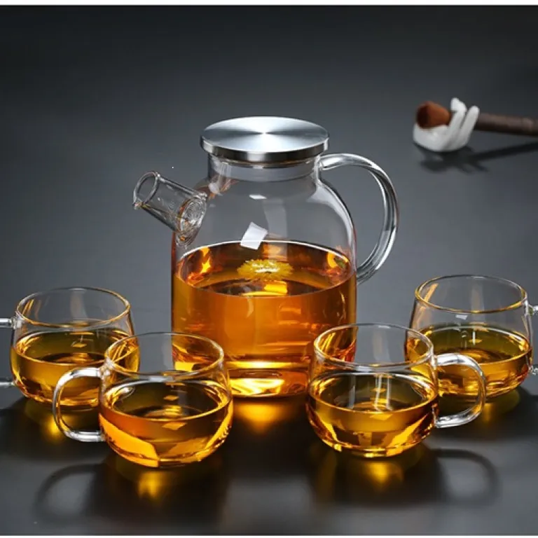 قوری شیشهای خانگی مقاوم به حرارت بالا برای جوشاندن آب، مناسب دم کردن چای با صافی، قوری چای گلدار، قابل استفاده روی شعله مستقیم، از جنس بوروسیلیکات