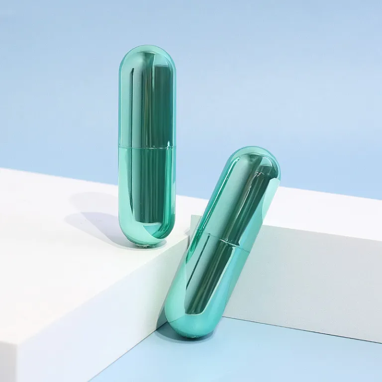 سفارشی OEM 3.5g تیوپ بیضی لب‌گلاس و رژ لب با آبکاری سبز فیروزه‌ای بسته‌بندی لوازم آرایشی کارخانه اصلی