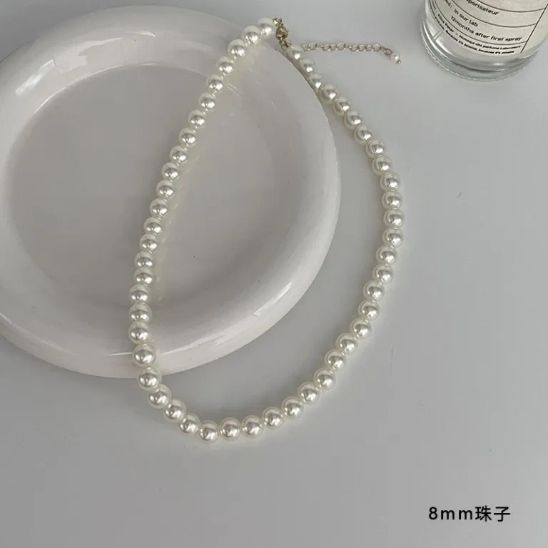 گردنبند مروارید طرحدار زنانه، سبک خاص و لوکس، طراحی سطح بالا، شیک و باوقار، گردنبند استخوانی، گردنبند یقهای، گردنبند مناسب پلیور، زنجیر مروارید