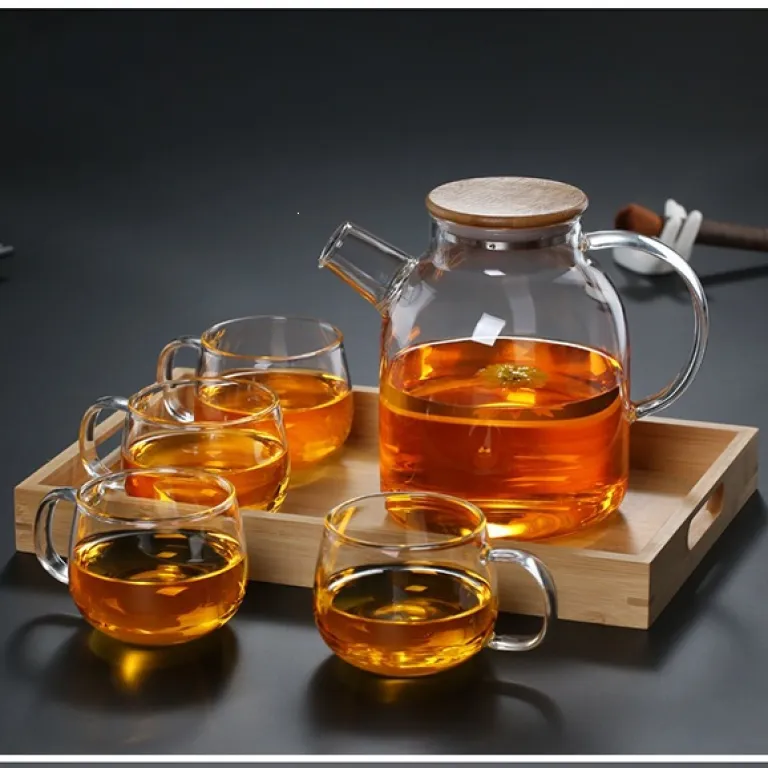 قوری شیشهای خانگی مقاوم به حرارت بالا برای جوشاندن آب، مناسب دم کردن چای با صافی، قوری چای گلدار، قابل استفاده روی شعله مستقیم، از جنس بوروسیلیکات