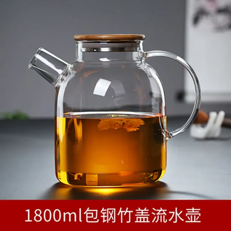 قوری شیشهای خانگی مقاوم به حرارت بالا برای جوشاندن آب، مناسب دم کردن چای با صافی، قوری چای گلدار، قابل استفاده روی شعله مستقیم، از جنس بوروسیلیکات